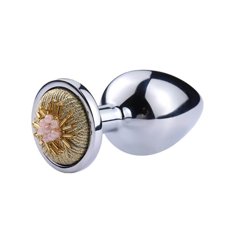 Plug anal avec perles "fleur" en métal