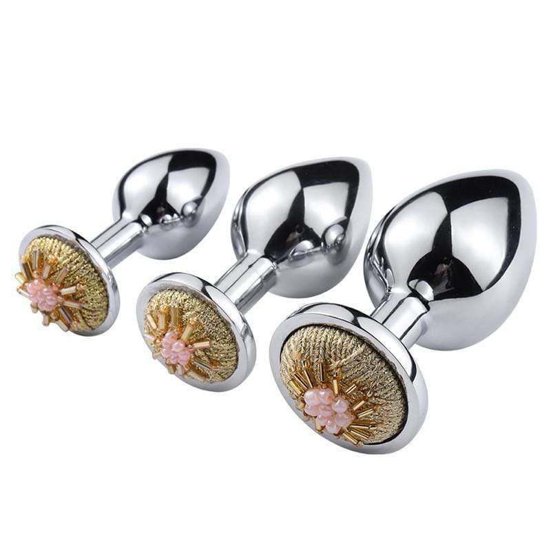 Plug anal avec perles "fleur" en métal