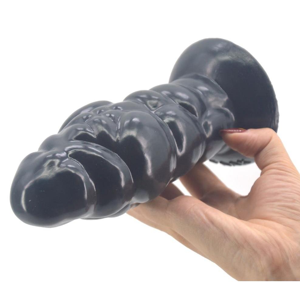 Plug anal XL ventouse en silicone taille en main