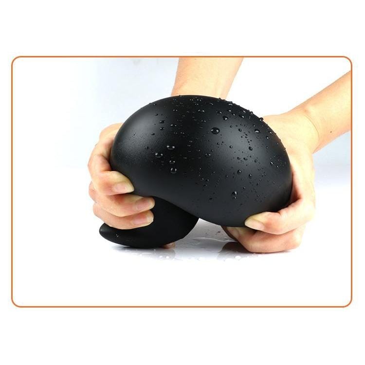 Plug anal XXL œuf flexible en silicone noir souple