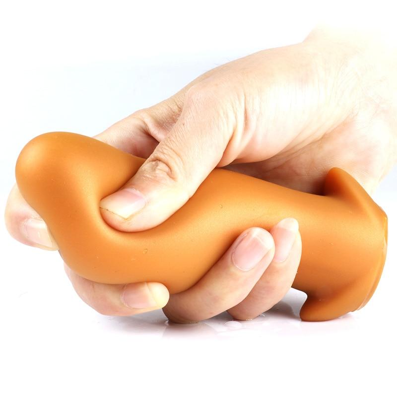 Plug anal XL œuf flexible en silicone or taille